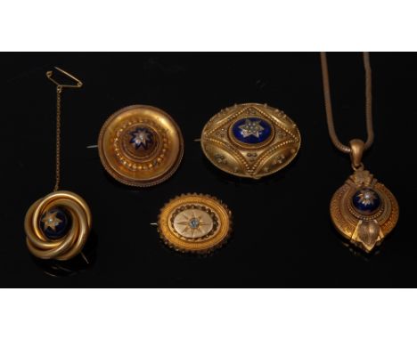 A Victorian Grecian Revival gilt metal oval brooch, the centre set with an oval blue enamel reserve applied with seed pearls,