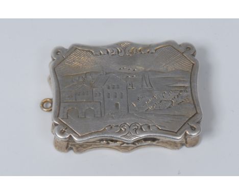 An early Victorian silver rounded rectangular 'castle top' vinaigrette, hinged cover engraved with a harbour, gilt interior w