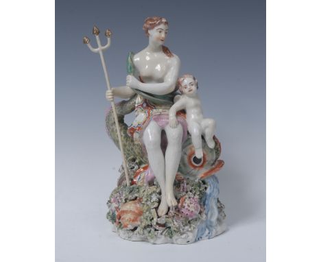 A large Derby Patch Mark  figural group, Venus and Cupid, she seated on he back of a dolphin, scantilly draped holding a trid