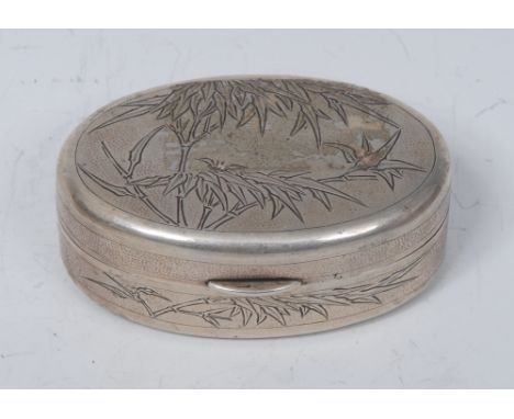 A Chinese silver oval snuff box, engraved with leafy bamboo on a textured ground, 6.5cm wide, maker NK, c.1900