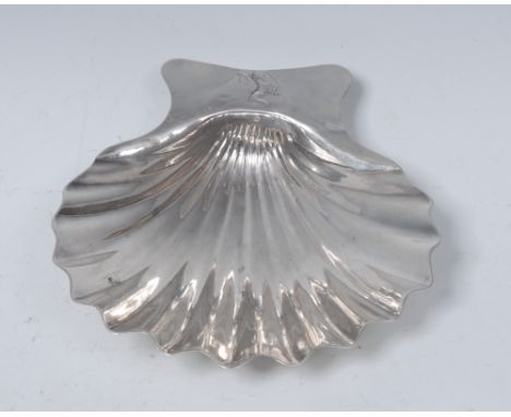 A George III silver butter shell, crested, 12cm wide, maker's mark WP only, c.1795   Condition Report:  Old patch repair at h
