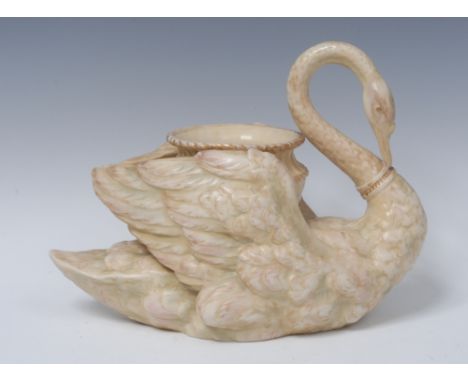 A Royal Worcester swan, in blush ivory, with basketwork vase on it's back, picked out in gilt, 26cm wide, printed crown and c