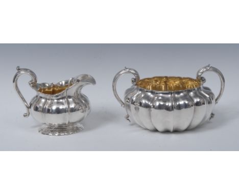 Paul Storr - a George IV silver melon shaped cream jug and sugar basin, acanthus capped scroll handles, gilt interiors, the s