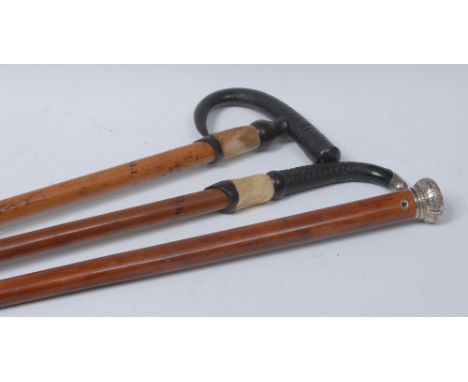 A Victorian malacca gentleman's walking cane, domed pommel, 90cm long; an alpine walking stick, hoof and horn handle, the sha