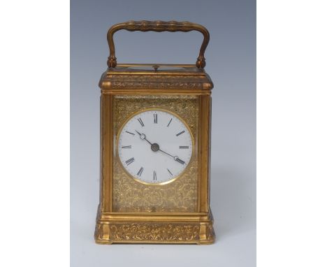 A French gilt brass quarter-repeating carriage clock, 5.5cm circular dial with Roman numerals, eight-day movement striking on