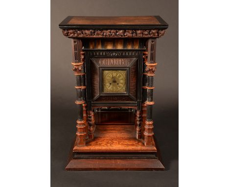 An imposing Victorian Arts and Crafts oak, boxwood, parcel-gilt and ebonised bracket clock, 12cm square brass dial with Roman