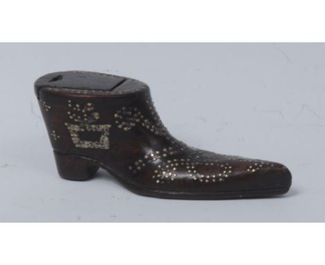 A late 18th century mahogany novelty snuff box, as a shoe, decorated overall in brass pinwork with stylised flowers and vases