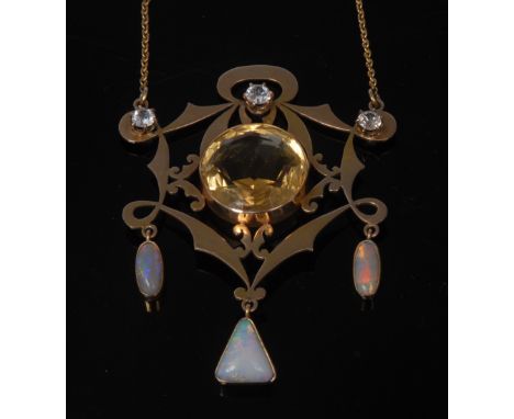 An early 20th century pendant, set with faceted citrine to centre the 15ct gold scroll frame with three synthetic white sapph