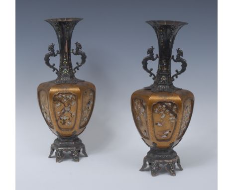 A pair of Japanese silver, lacquer, shibayama and enamel vases, each hexagonal body decorated with birds and blossoming branc