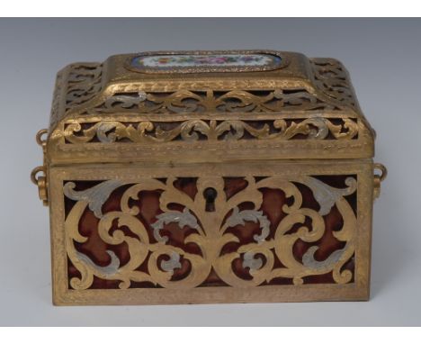 A 19th century French porcelain mounted gilt and silvered brass rectangular dressing table casket, hinged cover set with an o