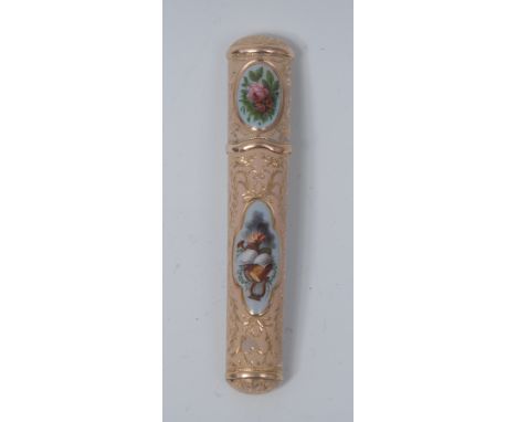 An 18th century 18ct gold and enamel needle case, decorated in polychrome with panels of regalia, musical trophies and summer