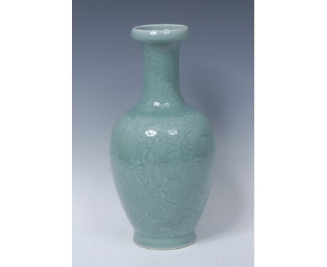 A Chinese baluster vase, in celadon, in light relief with stylised chrysanthemums, 31cm high, seal mark   Condition Report:  