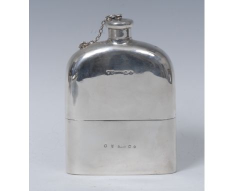 A Victorian Scottish silver hip flask, screw-fitting cover with chain, stirrup cup to base with gilt interior, 12cm high, Ham