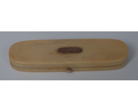 A George III gold coloured metal mounted ivory toothpick case, hinged cover, 8cm wide, c.1810   Condition Report:  The gold c