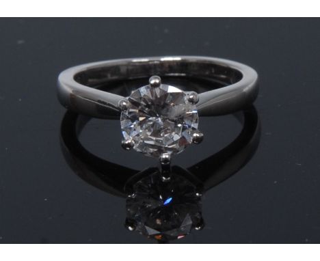 A diamond solitaire ring, round brilliant cut diamond approx 1.5ct, six claw crown, platinum shank, size K, 5.3g gross   Cond