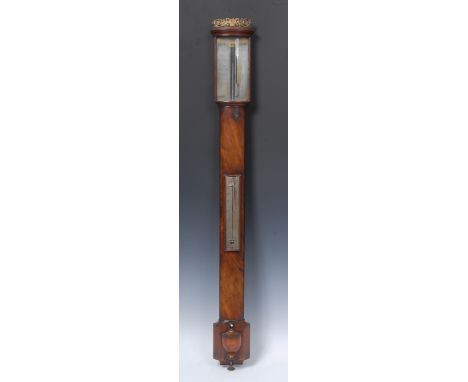 An early 19th century Russian mahogany stick barometer, silvered dial, mercury thermometer, the case with swan and basket gil