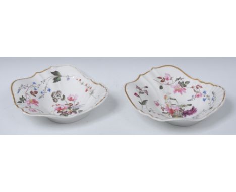 A pair of  H & R Daniel shell shaped dishes, painted by Pollard, with colourful floral spray and foliate samples, gilt line r