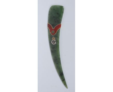 A fine Russian nephrite jade paper knife, in the manner of Fabergé, the curved blade centred by a diamond and gold Prince of 