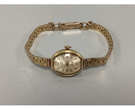 Rotary; A 9ct Gold Ladies Wristwatch, the signed dial with Arabic and line markers, within plain case, to integral 9ct gold b