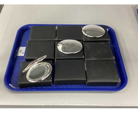 A Collection of Modern Compact Mirrors, of plain oval form, boxed.