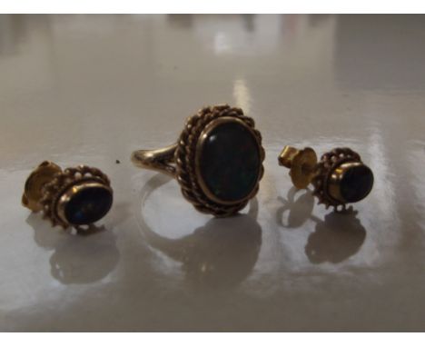 9 carat gold ring and earrings, set with opals, ring size K