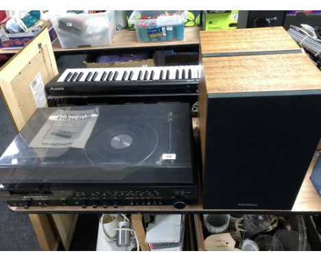 A National Panasonic SG-1090 L compact stereo system with teak cased speakers 
