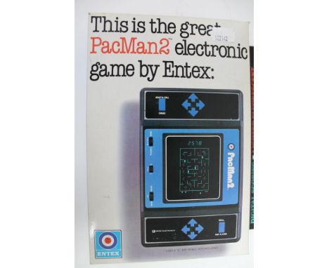 A boxed Entex PacMan 2 electronic hand held game 