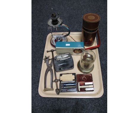 A tray of Art Deco lamp base, miniature PYE transistor radio, razors, clock under shade, ashtray etc 