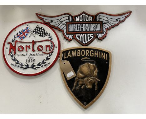 Three cast iron plaques; Lamborghini, Harley Davidson and Norton 