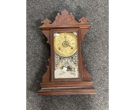 An antique American Buffalo mantel clock by The Gilbert Clock Company 