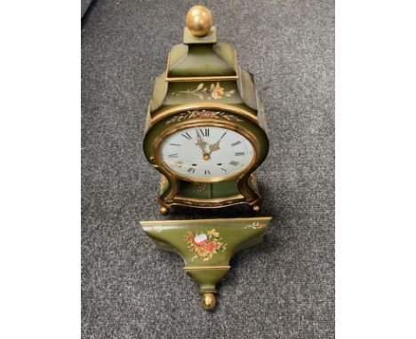 A Swiss made Bucherer bracket clock with bracket