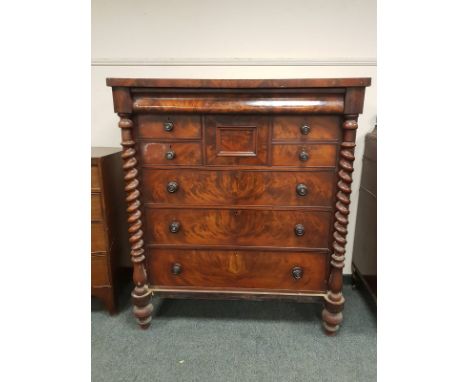 A Victorian mahogany Scotch chest on barleytwist supports with central hat drawer, width 124 cm. CONDITION REPORT: In stable 