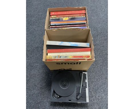 A portable Fidelity 7" record player together with two boxes containing vinyl LP box sets