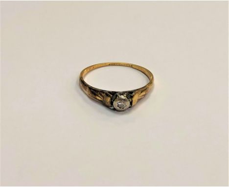 An antique 18ct gold diamond set solitaire ring, 1.7g.