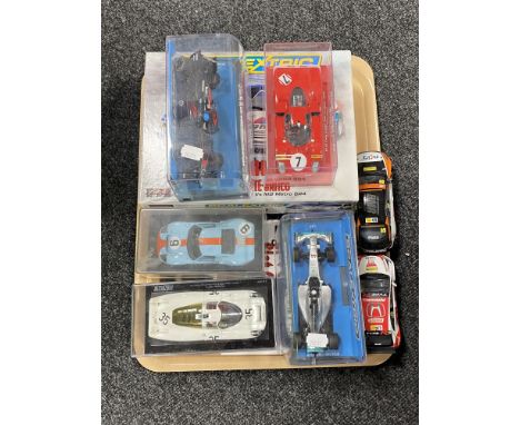 A tray of boxed Scalextric 1986 Monte Carlo rally car pack together with five further Scalextric cars in display cases and tw
