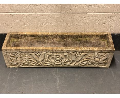 A concrete garden trough, length 98 cm.