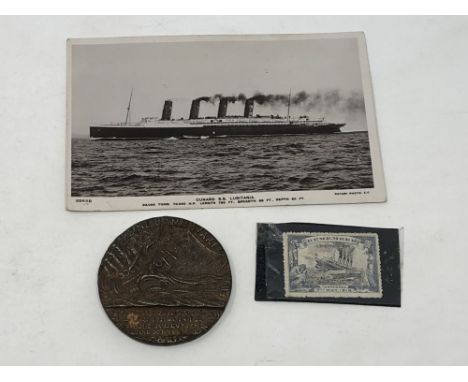 A Lusitania postcard sent from Grenada together with a Lusitania medal and stamp