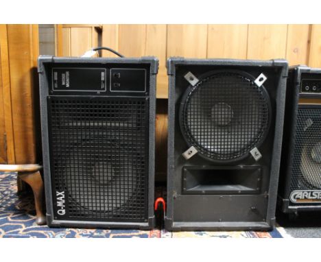 A Q-max Wedge monitor, PA speaker and one other PA speaker 
