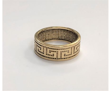 A 9ct gold textured band ring, 6.2g.