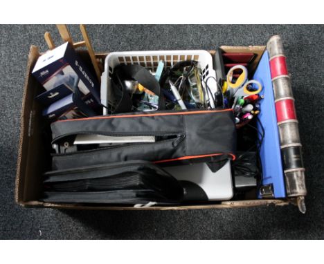 A box of pens, stationery, CD's, waster paper basket, camera tripod in carry bag, key box etc 