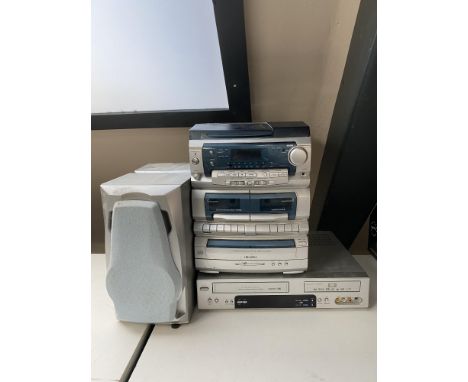 A Bush hifi system together with a Daewoo DVD VCR recorder 