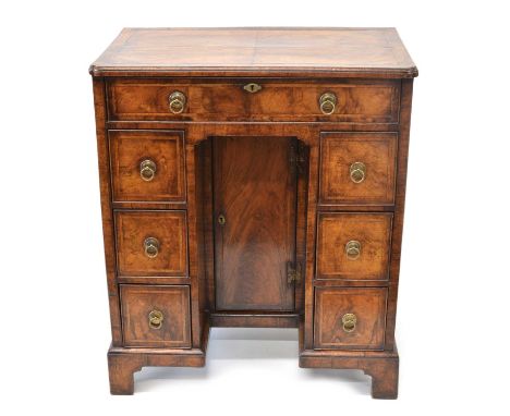 George II Walnut Kneehole Desk of Small Proportions George II figured walnut feather-banded ladies kneehole desk of small pro