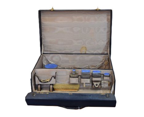 A George V silver and enamelled dressing table set, A George V silver and enamelled dressing table set, comprising silver lid