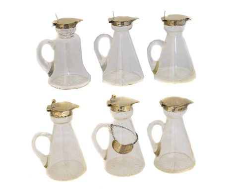 Six Edward VII and later silver and clear glass toddy jugs,  Six Edward VII and later silver and clear glass toddy jugs, vari