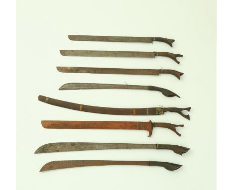 Sumatra, Aceh, a collection of eight various swords, sikin panjang, one with wooden scabbard with engraving, all with horn hi