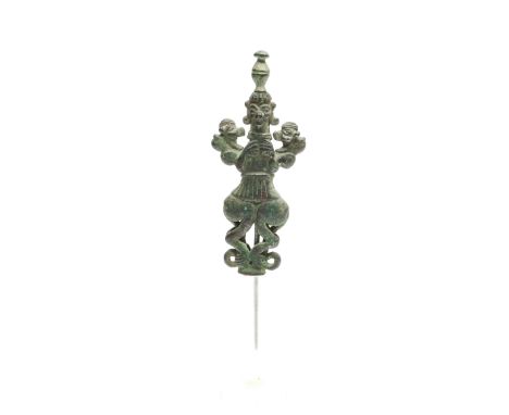 Luristan, a fine bronze final in the form of a 'beast-master', with a bronze pen topped by a rare poppy flower head. h. statu