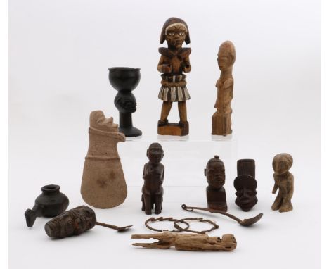 Various Tribal objects; a.o. two Cameroon terracotta pipe heads. [box]