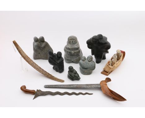 Canada, a collection of six Inuit stone sculptures; anthropomorph figures; one signed 1974.... and one with numbers, two with