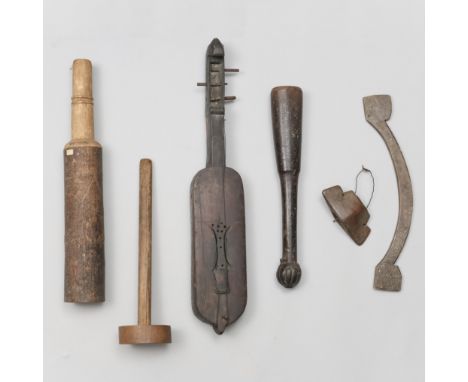 A hardwood mallet, possiby Near Eastern, a wooden harp and a wooden shaft, possibly African. Herewith a wooden implement and 