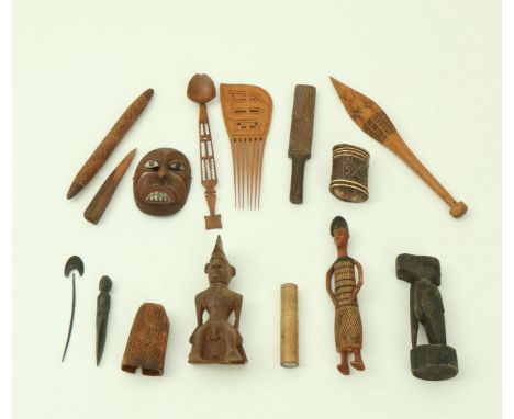 Various Tribal objects; a.o. Surninam, wooden comb and North West American Native mask. [box]